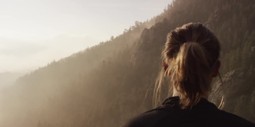 A woman overlooking a valley