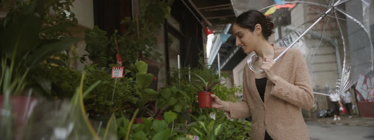 Woman stops at plant shop