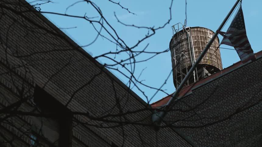 View of the top of a building with a water tower
