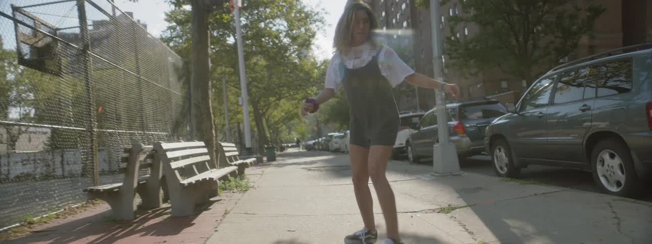 Woman Skateboarding In New York