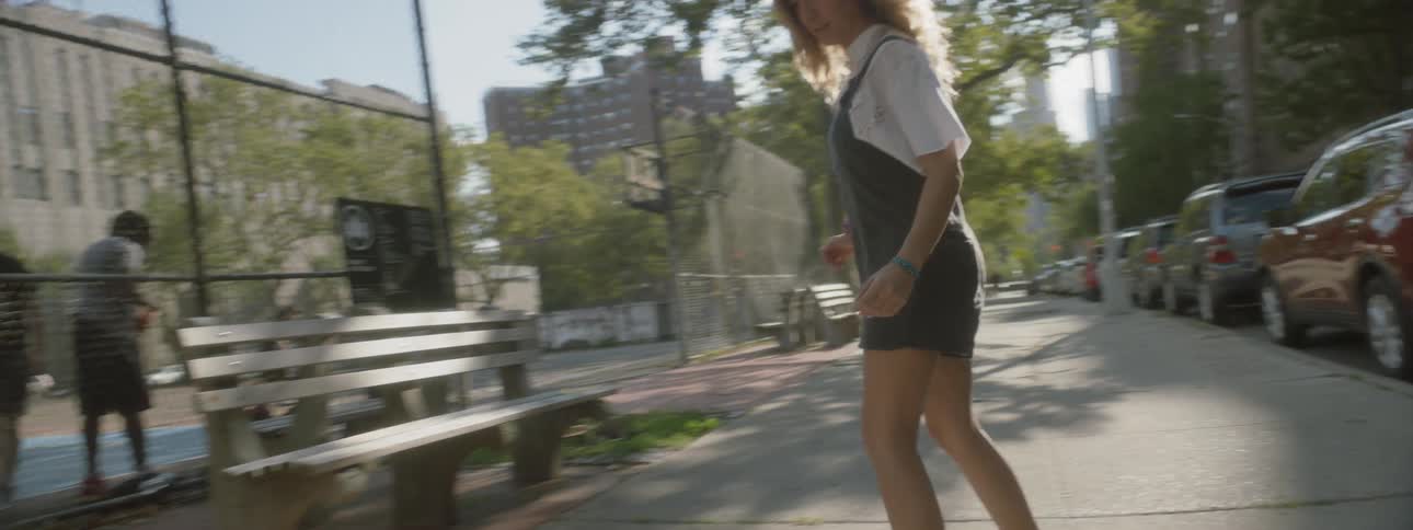 Woman Skateboarding In New York