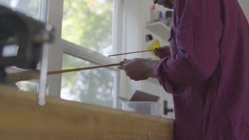 Man Making Fishing Pole