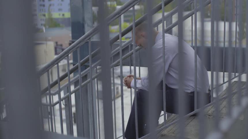 Man On Top Of A Parking Garage