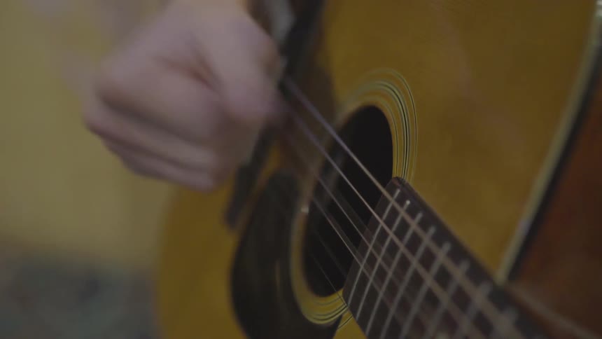 Man Playing Guitar