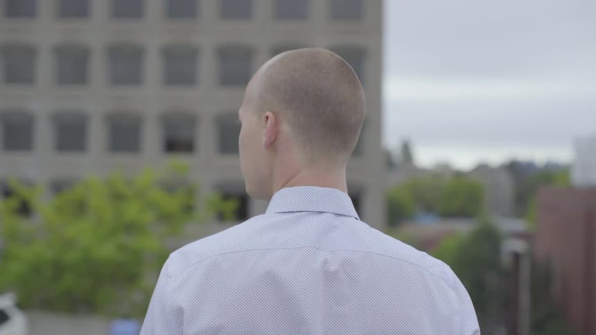 Man On Top Of A Parking Garage