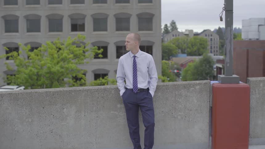 Man On Top Of A Parking Garage