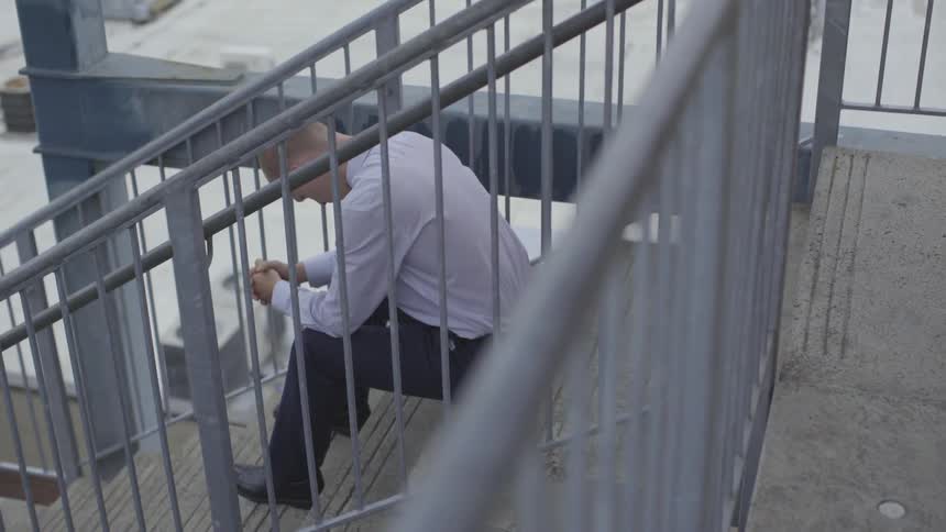 Man On Top Of A Parking Garage