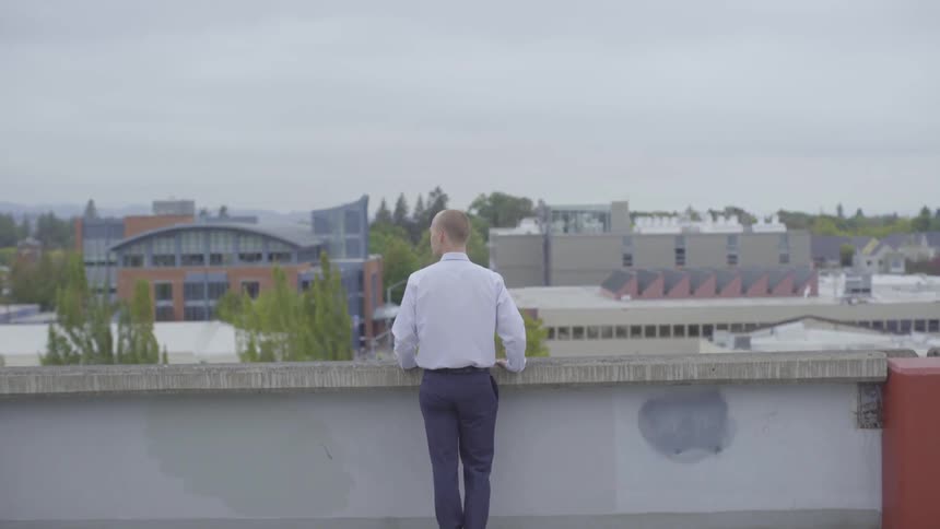 Man On Top Of A Parking Garage