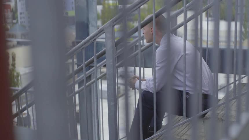 Man On Top Of A Parking Garage
