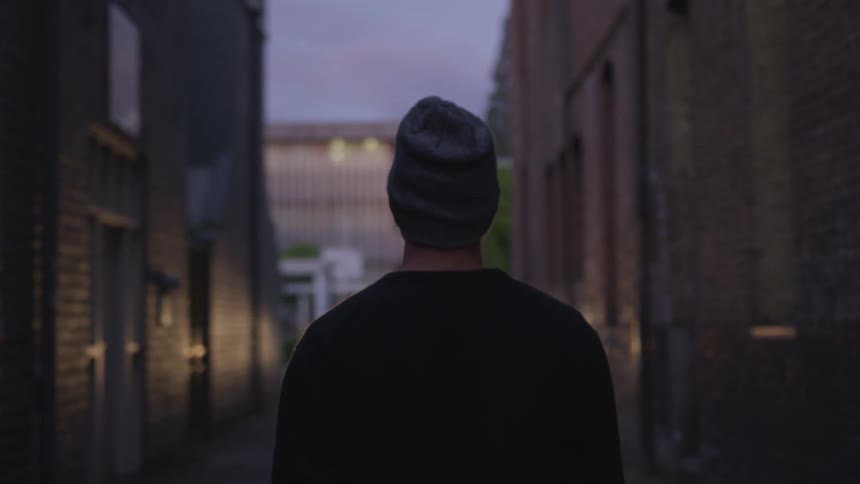 Man Running In Alley