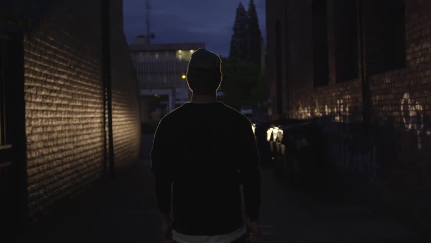 Man Running In Alley