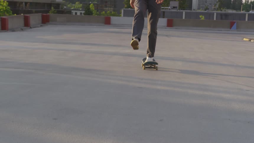 Man Skateboarding In The City