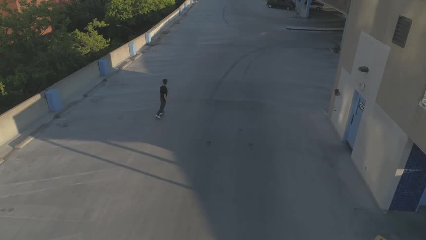 Man Skateboarding In The City
