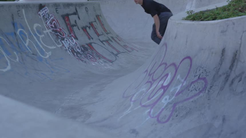 Man Skateboarding In The City