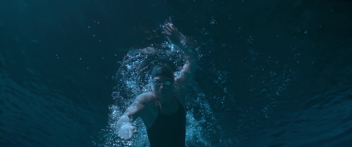 View underwater of a person swimming