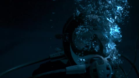 A person scuba diving underwater