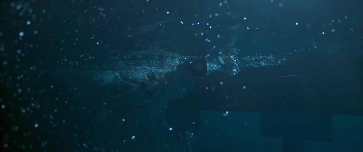 Underwater view of a man swimming