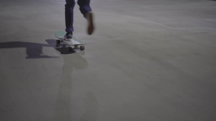 Man Skateboarding At Night