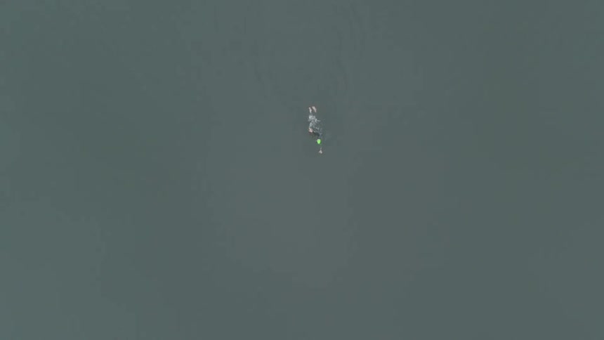 Man Swimming In Lake