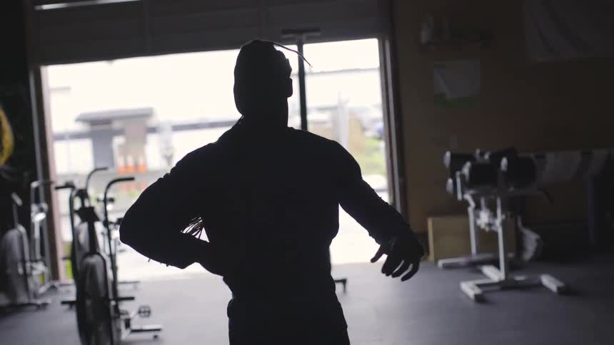 Man Working Out In Gym