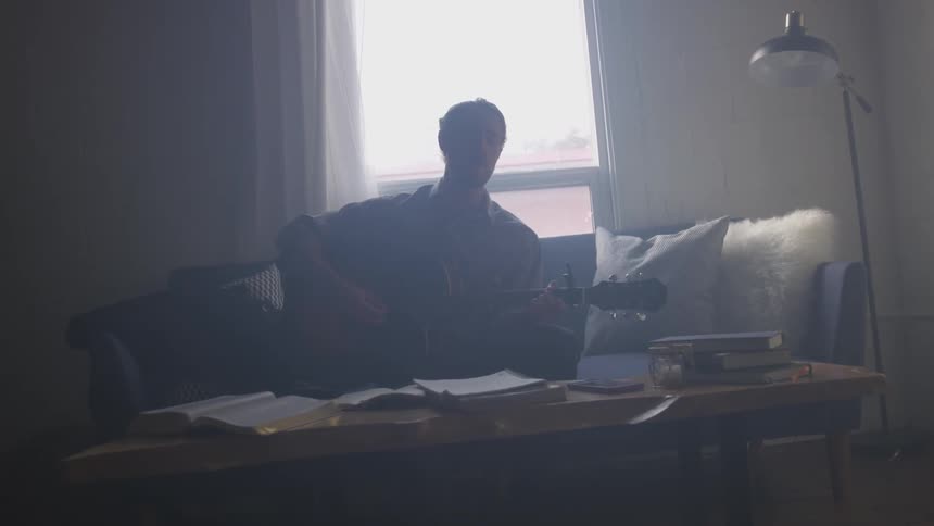 Musician In Small Apartment In New York City
