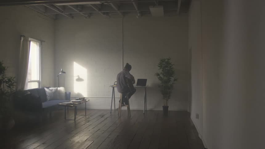 Musician In Small Apartment In New York City