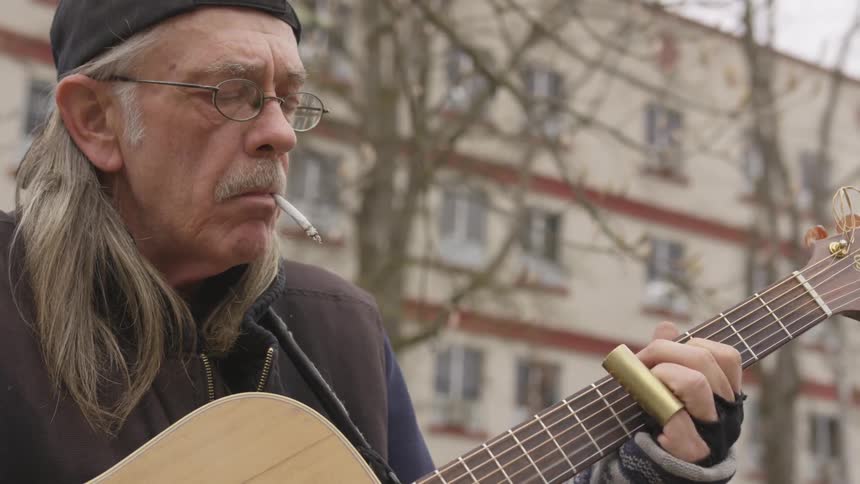 Musician Playing And Smoking