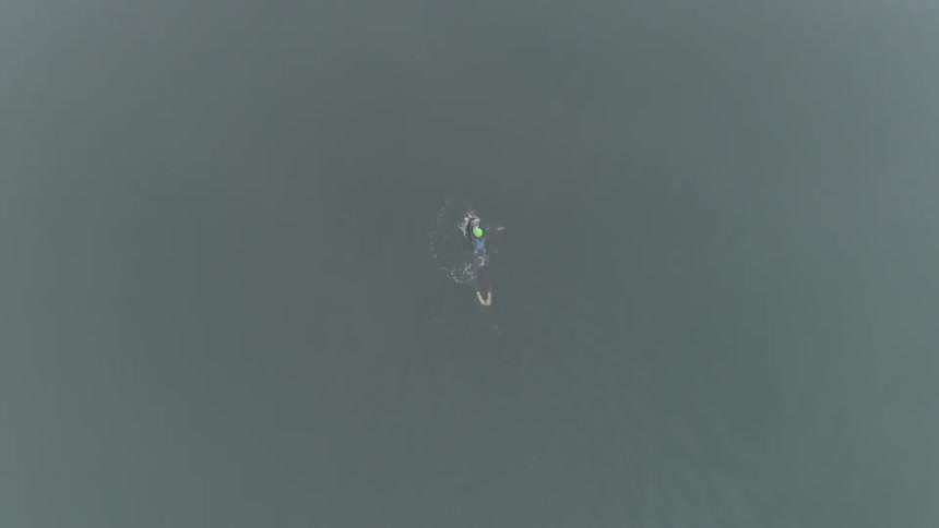 Man Swimming In Lake