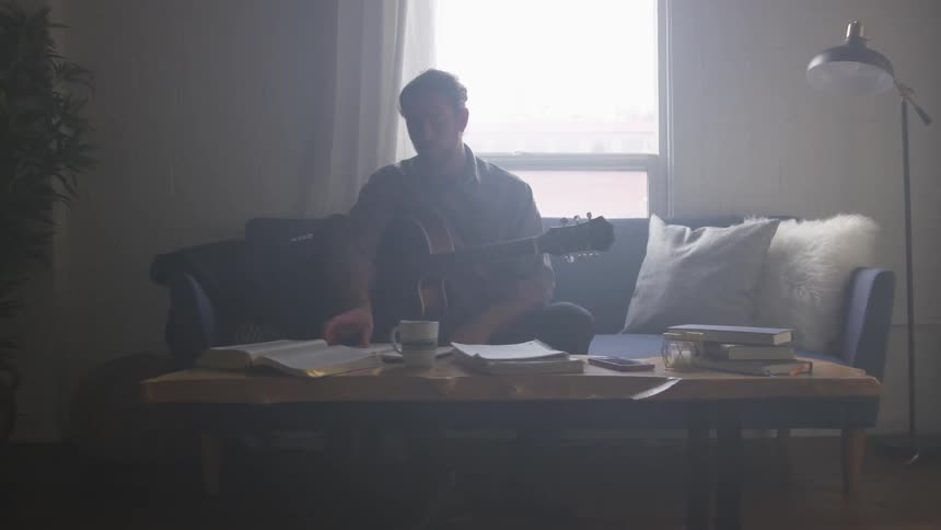 Musician In Small Apartment In New York City