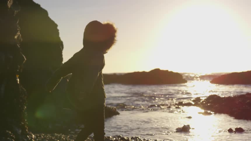 Mother And Daughter Visit Beach