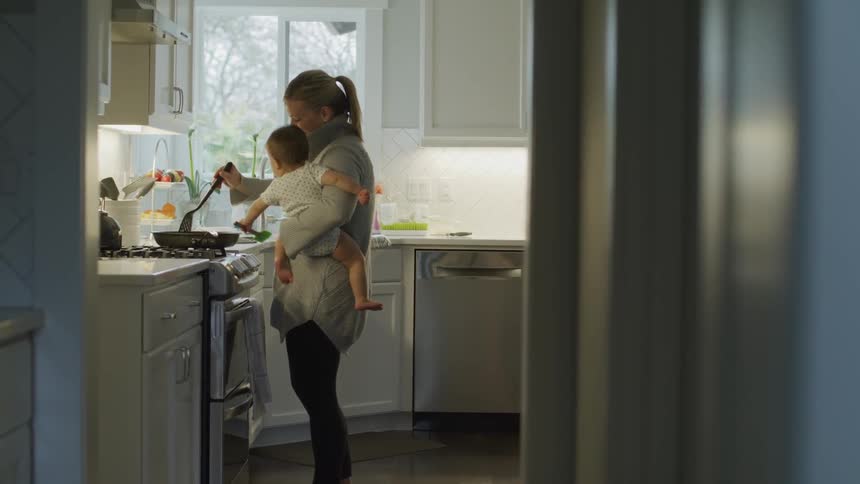 Mom And Daughter At Home