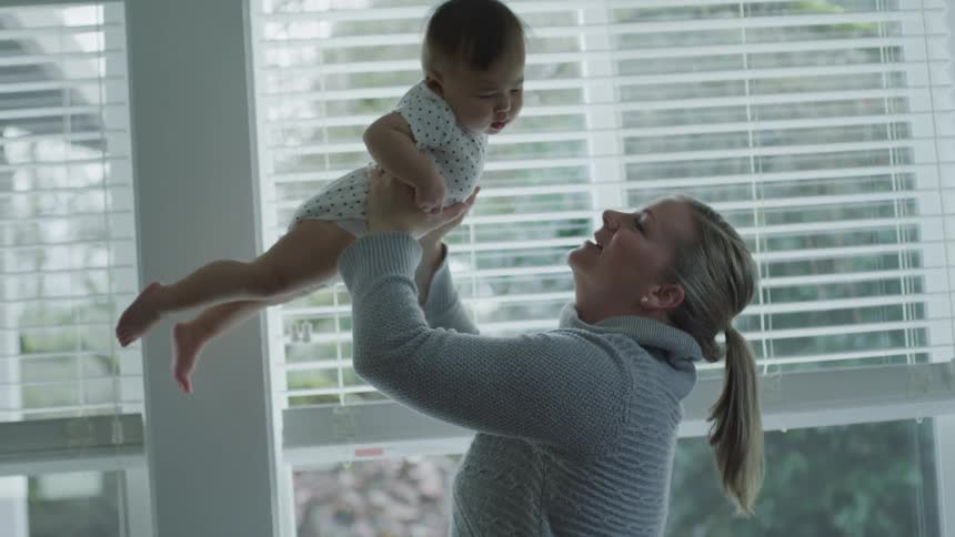 Mom And Daughter At Home