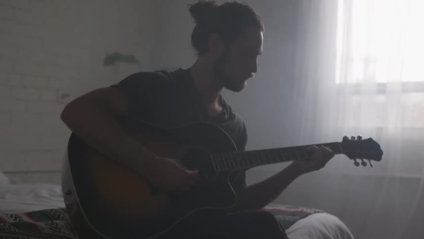 Musician In Small Apartment In New York City