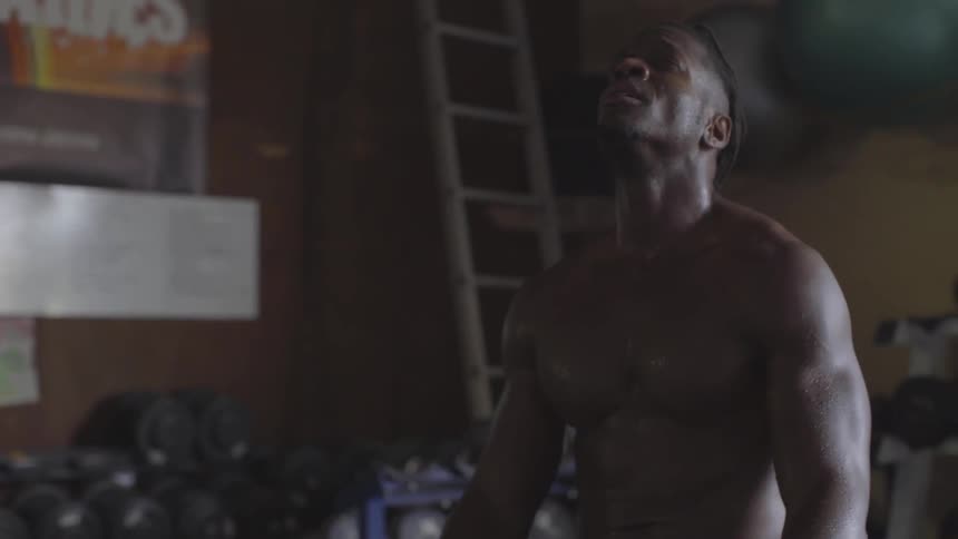 Man Working Out In Gym