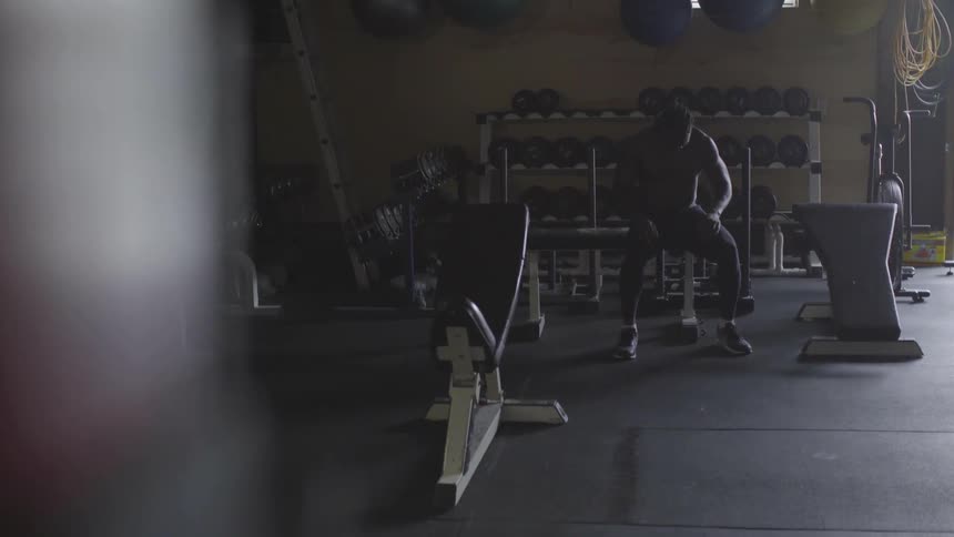 Man Working Out In Gym
