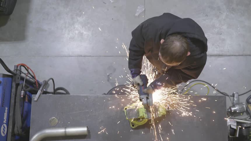Mechanic Working On Car