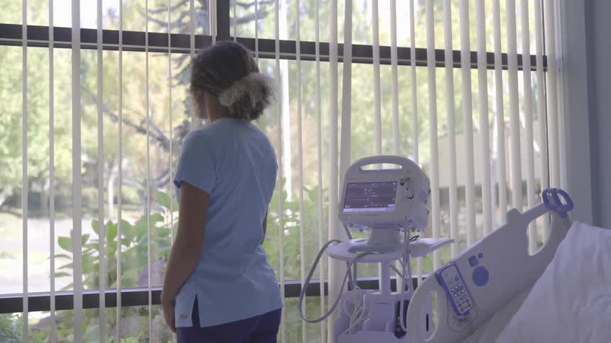 Nurse In Hospital Room