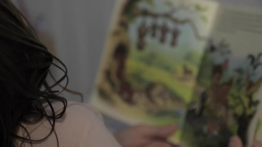 Mom And Daughter Reading Book
