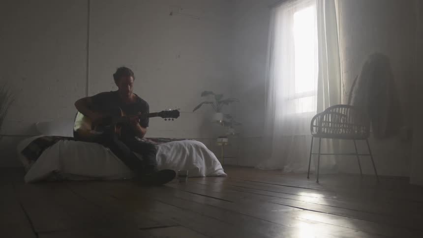 Musician In Small Apartment In New York City
