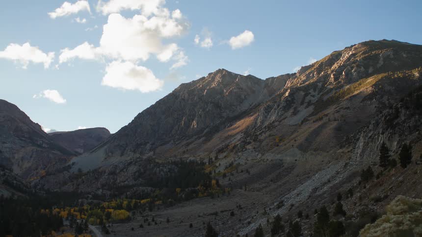 Clouds passing over a mountain