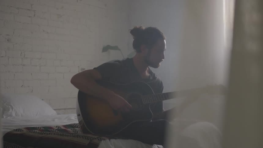 Musician In Small Apartment In New York City