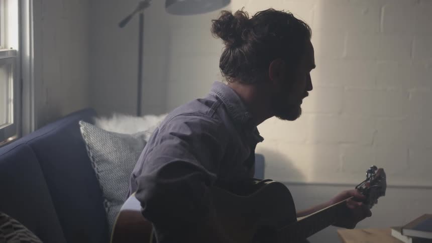 Musician In Small Apartment In New York City