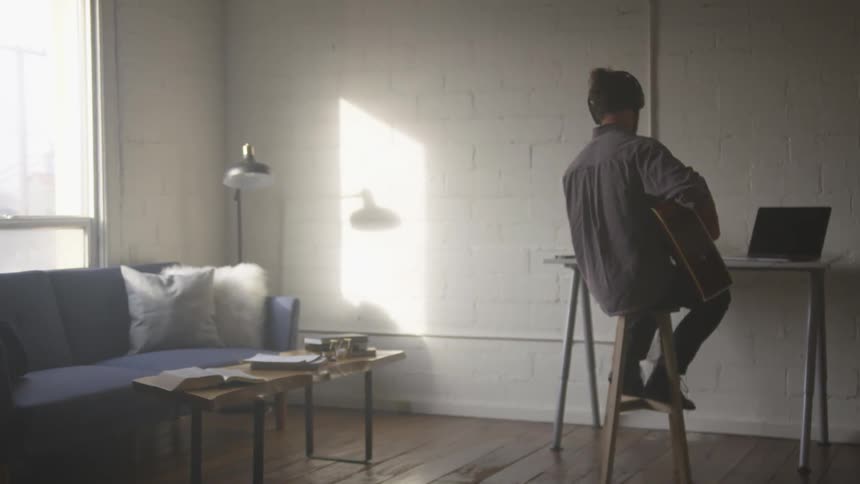 Musician In Small Apartment In New York City