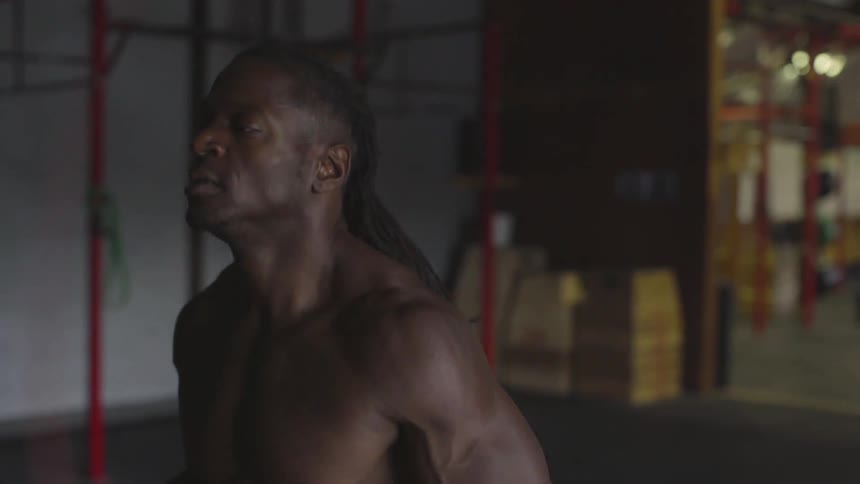 Man Working Out In Gym