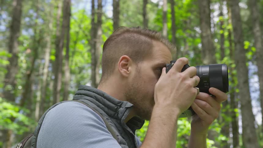 Photographer Hiking In Nature