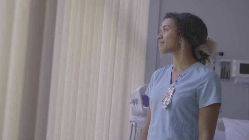 Nurse In Hospital Room