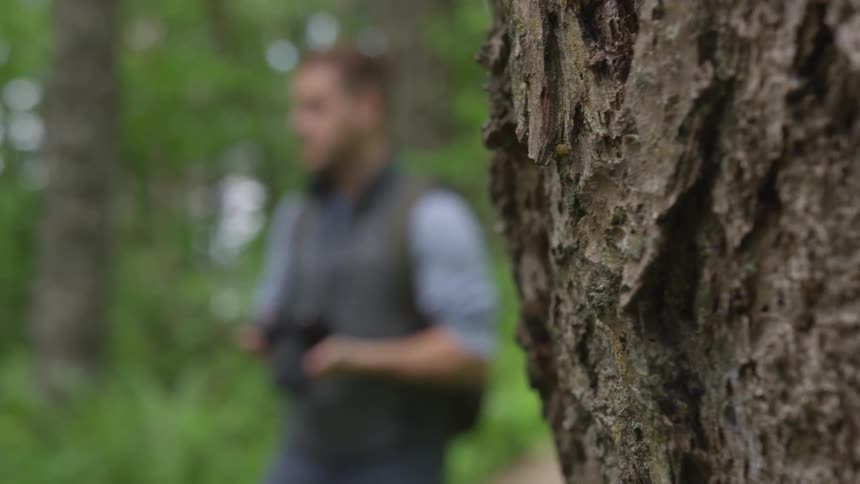 Photographer Hiking In Nature