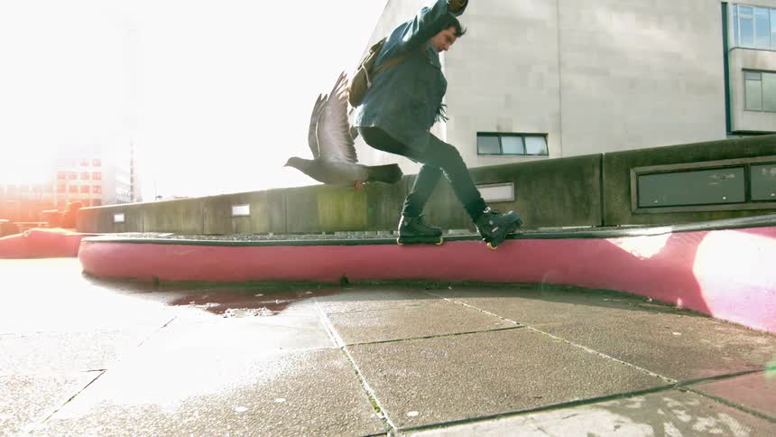 A person skateboarding outdoors
