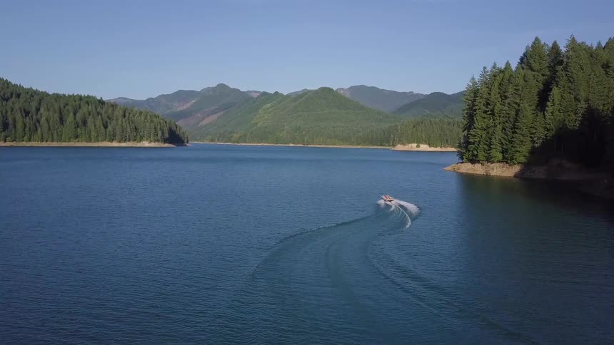 People Riding In Boat On Lake Aerials