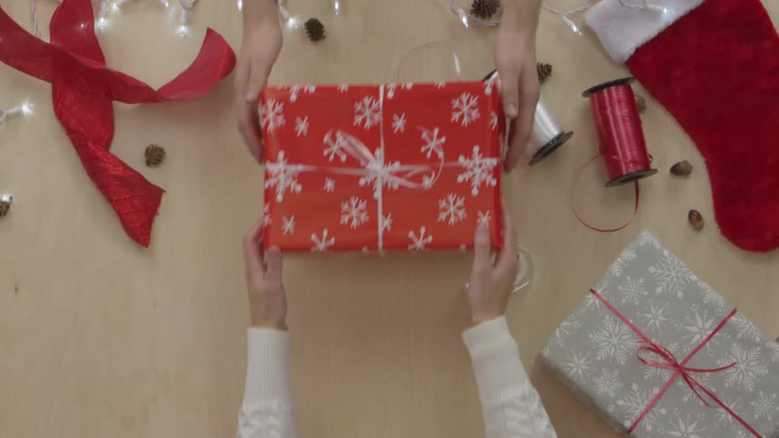 Person Wrapping Gifts